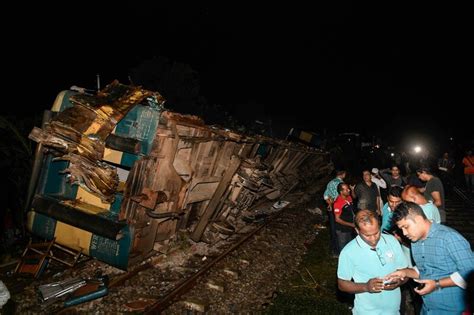 Fire official says two trains collided outside the Bangladeshi capital, killing a dozen people and injuring scores