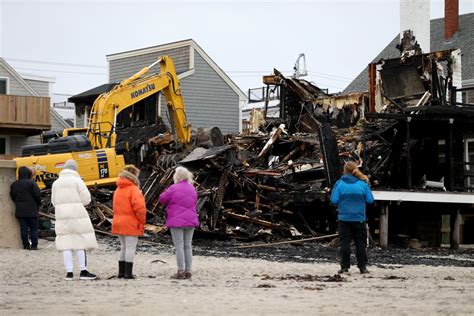 Fire officials investigating massive blaze that damaged multiple homes in Scituate