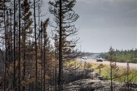 Fire on outskirts of Hay River gets significant rain, officials say