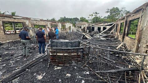 Fire razes school dormitory in Guyana, killing at least 19 children, many of them Indigenous