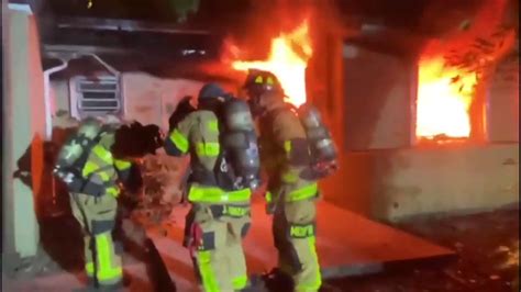 Fire rescue extinguishes flames engulfing South Miami home