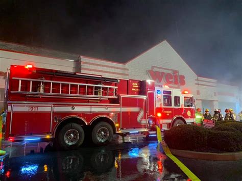 Fire rips through liquor store in Grafton