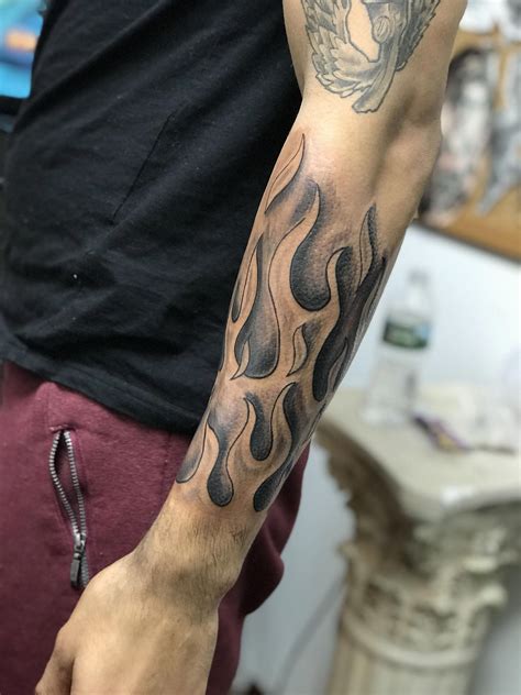 Fire is the ultimate symbol of passion and power. From small to big, simple to intricate, these fire tattoos will inspire your next ink. . 