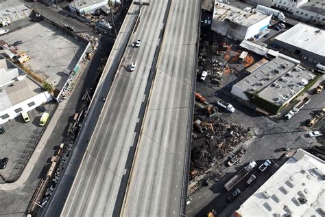 Fire that indefinitely closed section of vital Los Angeles freeway was arson, governor says