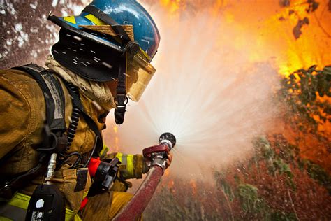 Firefighter. FIREFIGHTER definition: 1. a person whose job is to stop fires from burning 2. a person whose job is to stop fires from…. Learn more. 