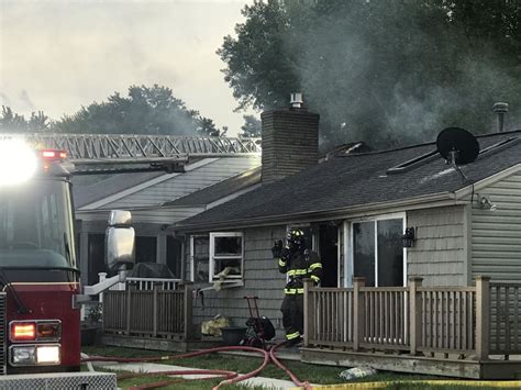 Firefighter, police officer taken to hospital after responding to fire ...