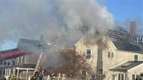 Firefighters battle 2-alarm fire in Medford Tuesday morning