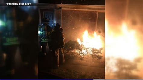 Firefighters battle wind-whipped fire in Wareham