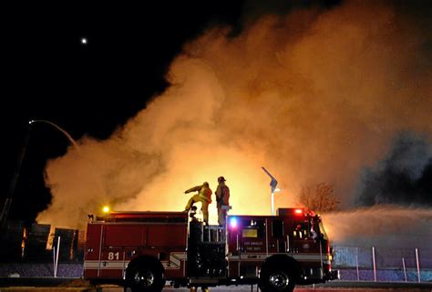 Firefighters battling blaze at abandoned lumber yard near The Stockyards