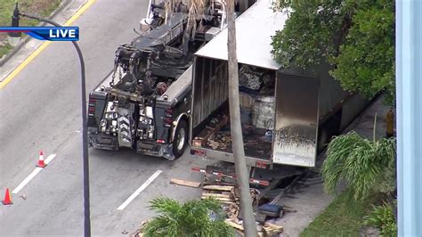 Firefighters extinguish semi-truck blaze in NW Miami-Dade