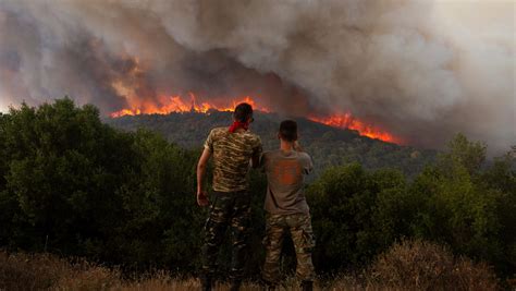 Firefighters in Greece struggle to control blazes in country’s northeast and near Athens