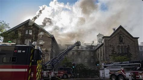 Firefighters put out Montreal heritage building fire over 24 hours after it ignited