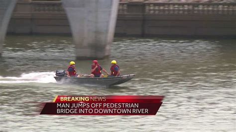 Firefighters rescue man who jumped from bridge into L.A. River
