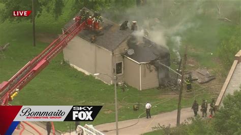 Firefighters respond to flames at North Florissant home