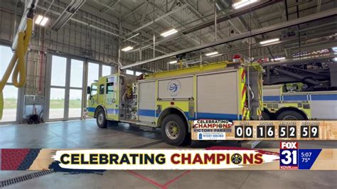 Firefighters roll dice for chance to drive Nuggets in victory parade