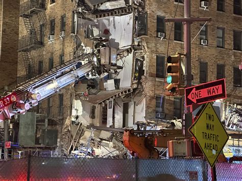 Firefighters search for anyone trapped after corner of Bronx apartment building collapses