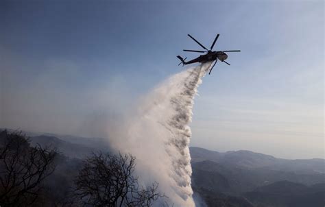 Firefighting helicopters collide over Southern California desert, killing 3 in crash