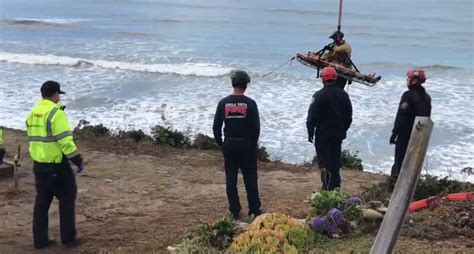 First responders rescue man stuck under concrete on side of cliff in Ocean Beach