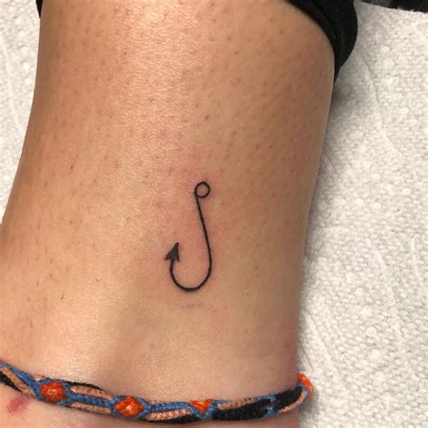 Moana Fish Hook Tattoo. Maui is a demigod- half God and half mortal. He brings super strength and supersizes with this iconic fish hook that is 20 long with motion-activated lights and sounds. Press the button on the bottom of the hook. Maui relives the adventure all over. People who obtain such adventures like to ink Moana Fish Hook Tattoo. . 
