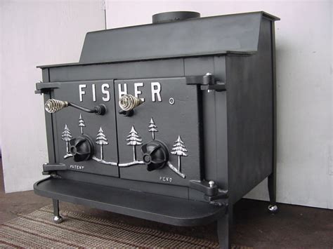 Fisher papa bear wood stove. Navigator Stove works has been building quality (made in the USA) tiny cast iron wood stoves since 1997. They are specifically made for boats but have been used for many other applications like RV’s, yurts and other small spaces. One thing I really like about these little stoves is they have a traditional look and … 
