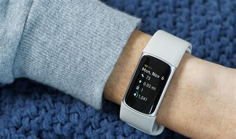 Fitbit charge 4 screen sensitivity.  A higher sensitivity might mean the screen turns on...