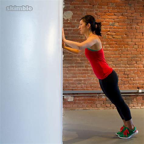 Fitness trainers share how to do wall push ups Well+Good