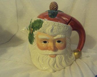 Santa Claus Teapot - Handpainted Christmas Ceramic Saint Nicholas Jolly Old St. Nick - Figural Santa Teapot - Kitchen Christmas Collectible (839) ... Vintage Fitz and Floyd Christmas Santa Teapot 40oz 1989 . Qty 1. (102) $ 60.00. FREE shipping Add to Favorites .... 
