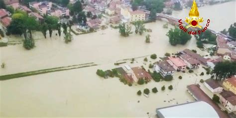 Five dead as heavy rains in northern Italy burst riverbanks, flood towns