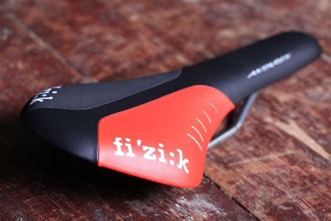Fizik. Available with either a full-carbon or carbon-reinforced nylon shells and both our lightweight carbon rail system or ultra-durable Kium hollow rails, our Adaptive line-up of 3-D printed cycling saddles represents a major leap forward in engineering comfort and performance for an overall better bike ride, from road to gravel and beyond. Subscribe. 