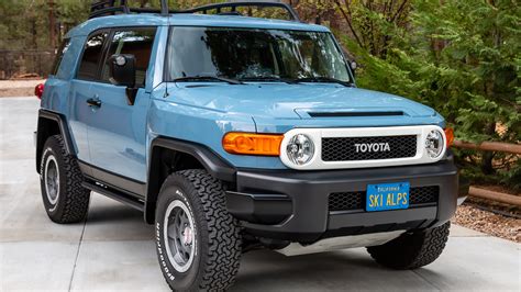 Toyota Announces 2014 Final Year for FJ Cruiser at 2013 SEMA Show | Off-Road.com Blog FJ CRUISER ULTIMATE EDITION TRAIL TEAMS KEY FEATURES Performance and Exterior Features - Unique white front grille surround and exclusive Monotone “Heritage Blue” paint - Blacked out bumpers, exterior mirrors and door handles