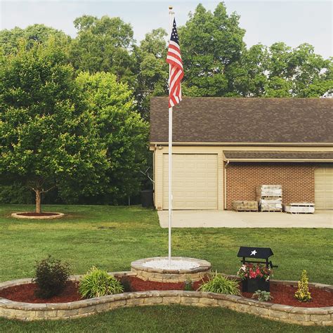 LET YOUR FLAG FLY: This sturdy in-ground flag holder holds flags up to 12 x 18 Inch nicely and can be used in a variety of locations; Set this flag pole stand in your front flower bed, in a planter on your porch, in the lawn or anywhere else; We even have customers that have used these flag stands to label the rows in their vegetable gardens. 
