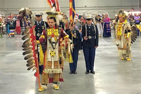 Flagstaff powwow. The Flagstaff High School Native American Club hosted the 44th annual Pow Wow on Friday evening. Clayton Benally, left, Maurice Begay, center, and Tanner Benally, 8, from the Indian Creek drum ... 