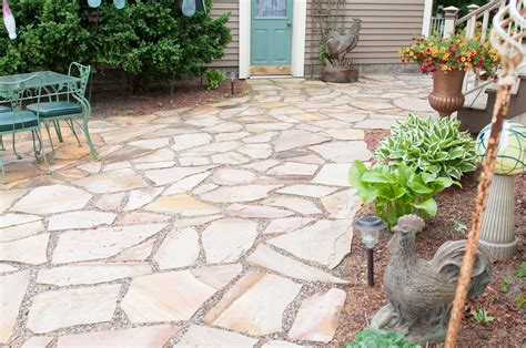 Flagstone patio. Flagstone patios make a unique design statement in your outdoor living space. Because they’re 100% natural stone (one of the only all-natural materials you can use for a patio), they offer one of a kind color combinations and shapes. If you’re thinking of using them for a patio space, you will need to build some flexibility into your patterns. 