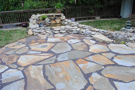 Flagstone patio cost. The Landscaping Network says the national average to have flagstone installed can be in the $15 to $20 per square foot range. The AZ Flagstone Supply company, located in Sedona, Arizona, lists its prices on its website. The thicknesses, ranging from one to three inches, can start at $120 per ton. 