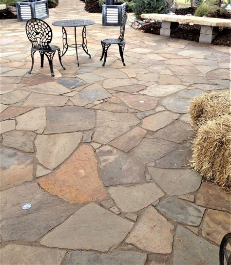 Natural stone colors add an organic element to your outdoor patio flo
