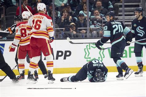 Flames’ Mangiapane suspended 1 game by NHL for cross-checking Kraken’s McCann
