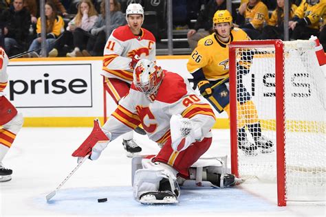 Flames score 4 goals in 1st, beat Predators 6-3 for 3rd straight win