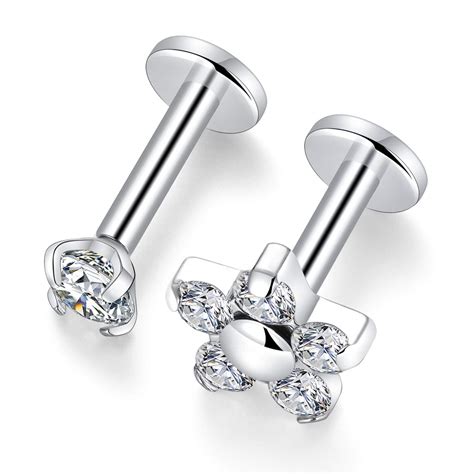Flat back studs. Stack your studs from biggest to smallest to create a unique look. 100% Hypoallergenic | Copper and Nickel Free | Waterproof | Tarnish Free. Material: G23 Titanium. Bar thickness (Gauge) : 16G/ 1,2mm. Bar length: 6mm / 8mm. Stone: Cubic Zirconia (clear) CZ Stone size: 2mm / 2,5mm/ 3mm. Threadless push in - consult how to use threadless ... 