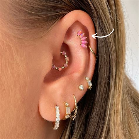 Flat helix piercing. A flat helix piercing typically describes the large section of relatively flat cartilage located between your outer and forward helixes, and this space can really allow you to get creative—if ... 