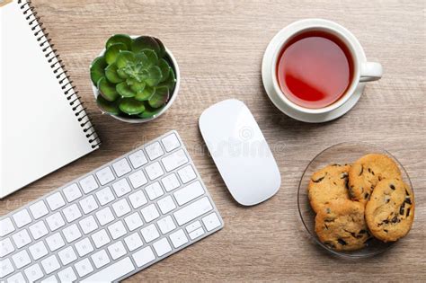 Flat lay of white chocolate chip cookies on keyboard computer …