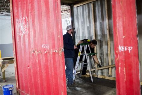 Flint company turns shipping containers into homes