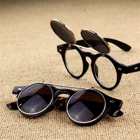 Flip up glasses. Steampunk Flip Up Style:Retro and trendy flip sunglasses are perfect for parties and 90's events. Double-layer lenses can be used as a pair of sunglasses and a pair of flat glasses. You can flip the outer colored lenses up and use inner clear lens only. 