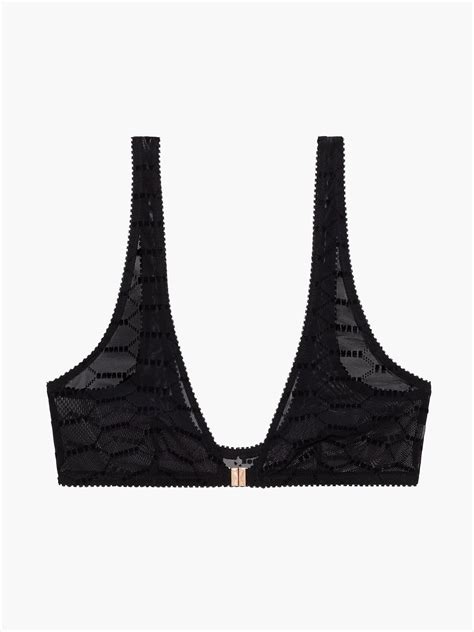 Shop davidsrack's closet or find the perfect look from millions of stylists. Fast shipping and buyer protection. Savage X Fenty Flocked Logo Bralette Wireless Unlined Sheer mesh supportive cups Flocked logo fabric Rose gold tone front closure Body: 94% Polyamide, 6% Elastane; Cup Lining: 88% Polyamide, 12% Elastane; Back Lining: 74% Polyamide, 26%.Elastane Hand wash cold, do not wring, do not ....