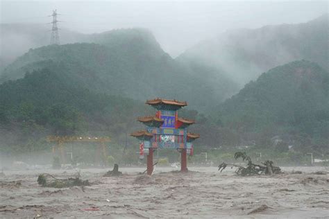 Flooding around Beijing kills at least 20