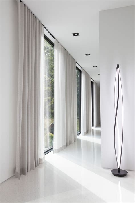 Floor to ceiling curtains. Oct 9, 2022 · Whether you have the standard 9-feet high ceiling or much higher, you can decorate your space with floor-to-ceiling curtains. It will help create an illusion of taller walls and bigger spaces. With the right tools on hand, it's easy to DIY this installation. 