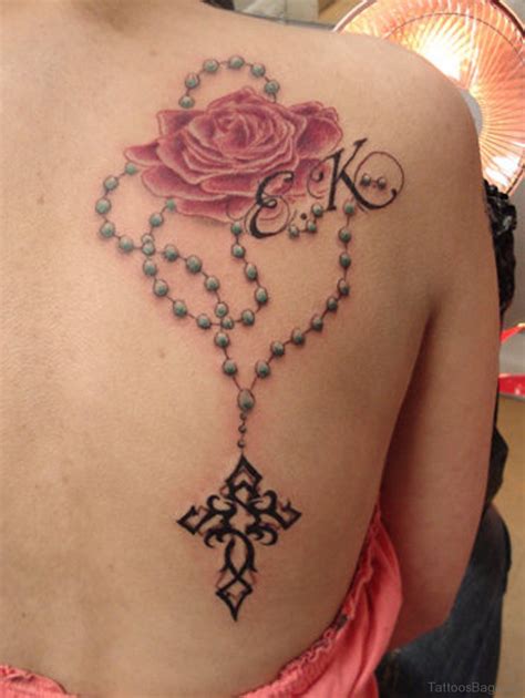 Flower rosary tattoos. 25 Rosary Tattoo Images, Pictures And Designs. Published on November 20, 2015 , under Tattoos. Love It 1. Black And Grey Rosary Cross In Praying Hand Tattoo On Bicep. 3D Green Rose With Rosary Cross Tattoo On Leg. 3D Rosary Cross Tattoo On Man Left Side Rib. Amazing 3D Rosary Cross In Praying Hand Tattoo On Man Side Rib. 