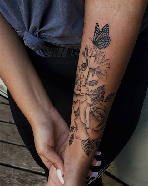 Try “ Tattoo Balm ”. This exquisite forearm tattoo art features a stunning portrait of a rose, capturing the essence of strength, love, and beauty, alongside the vast array of symbolic meanings that these floral tattoo designs hold. The half-slit flower beneath the rose brings an air of mystery and duality to the piece, inviting deeper .... 