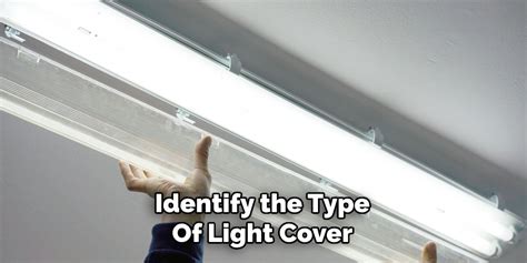 Fluorescent light covers wrap around.  These covers can be removed by gently pushi...