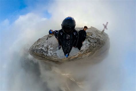 Flying A Wingsuit Through The Crack In Switzerland - InsideHook