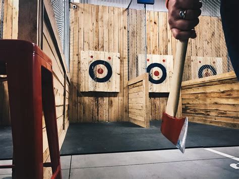 Flying axes. Flying Axes coaches are highly trained and committed to keeping the thrill of axe throwing as safe as possible. That commitment now includes COVID-19 precautions, including: Social Distancing between groups and coaches. Providing hand sanitizer at every cage. Rotating axes and washing handles between sessions. 